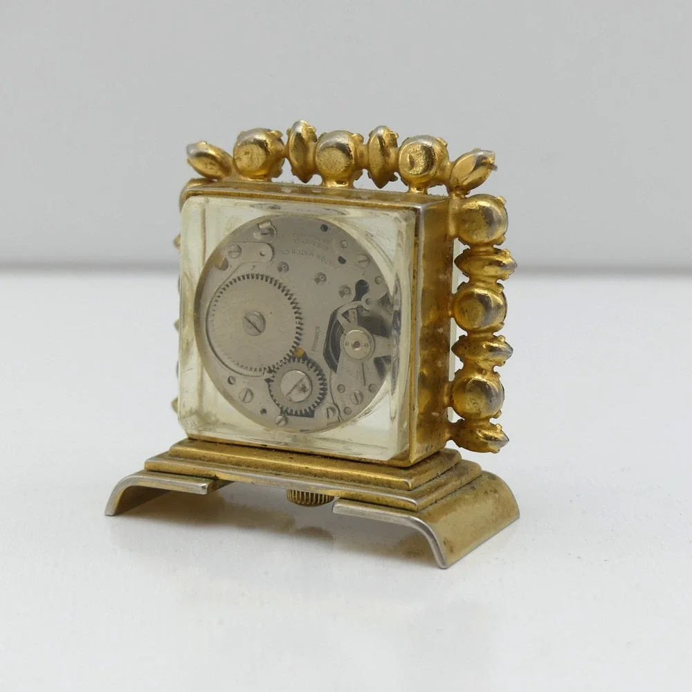 VTG Hilton Jeweled Antimagnetic Mini Skeleton Desk Clock Gold Tone Swiss Quartz